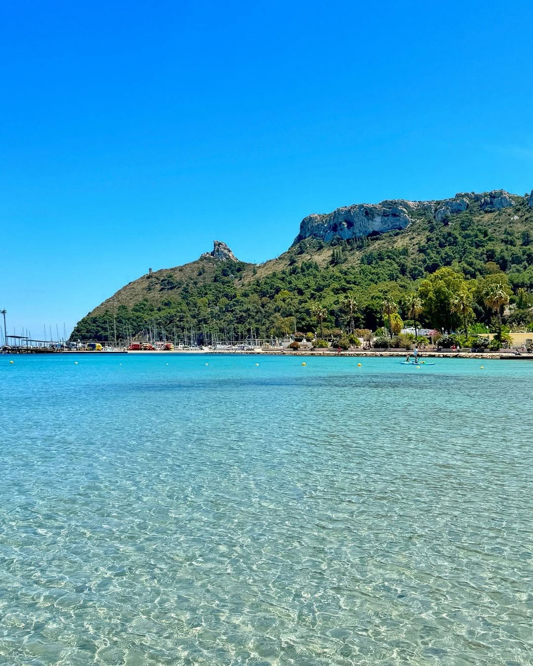 Cagliari bay with turquoise water and Sella del Diavolo headland
